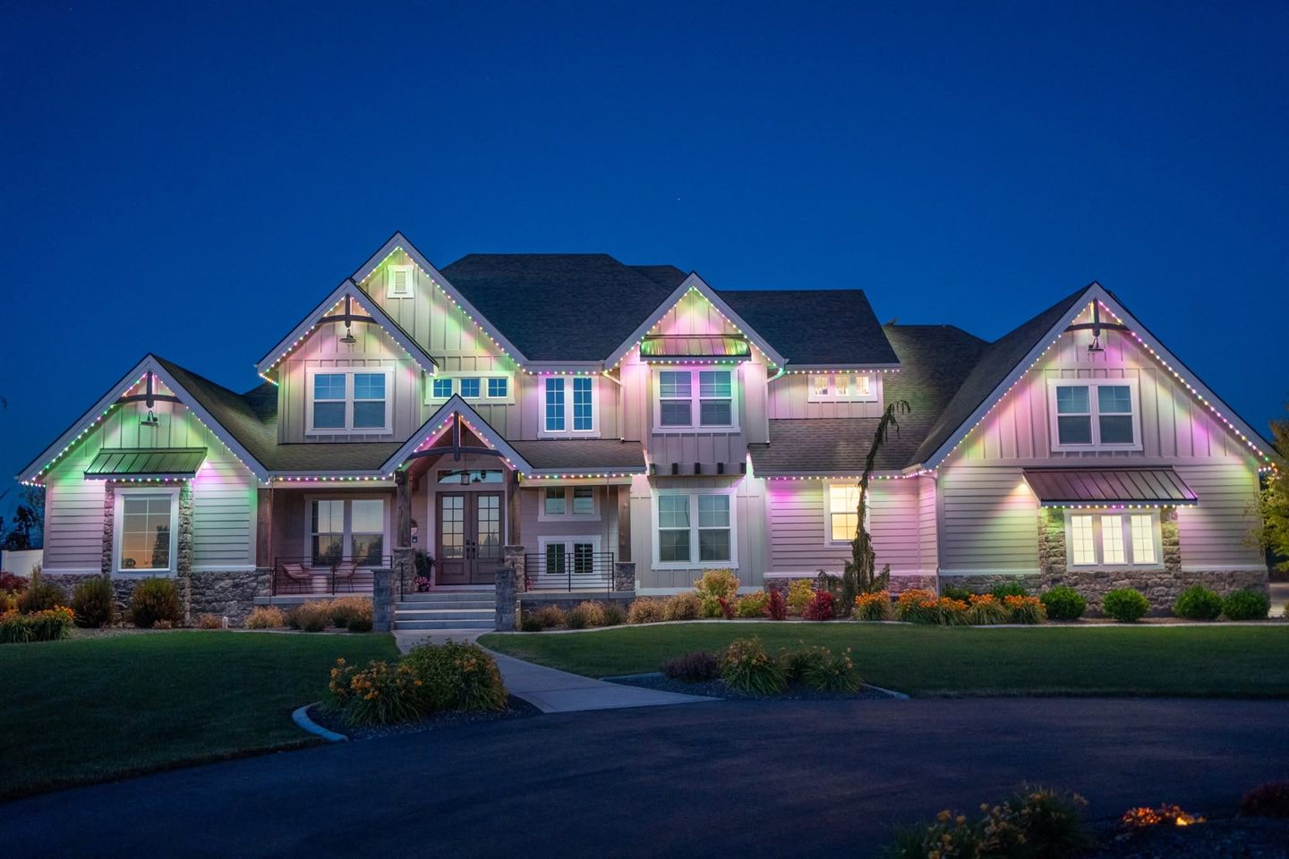 Permanent exterior lighting in full color on a large property at night